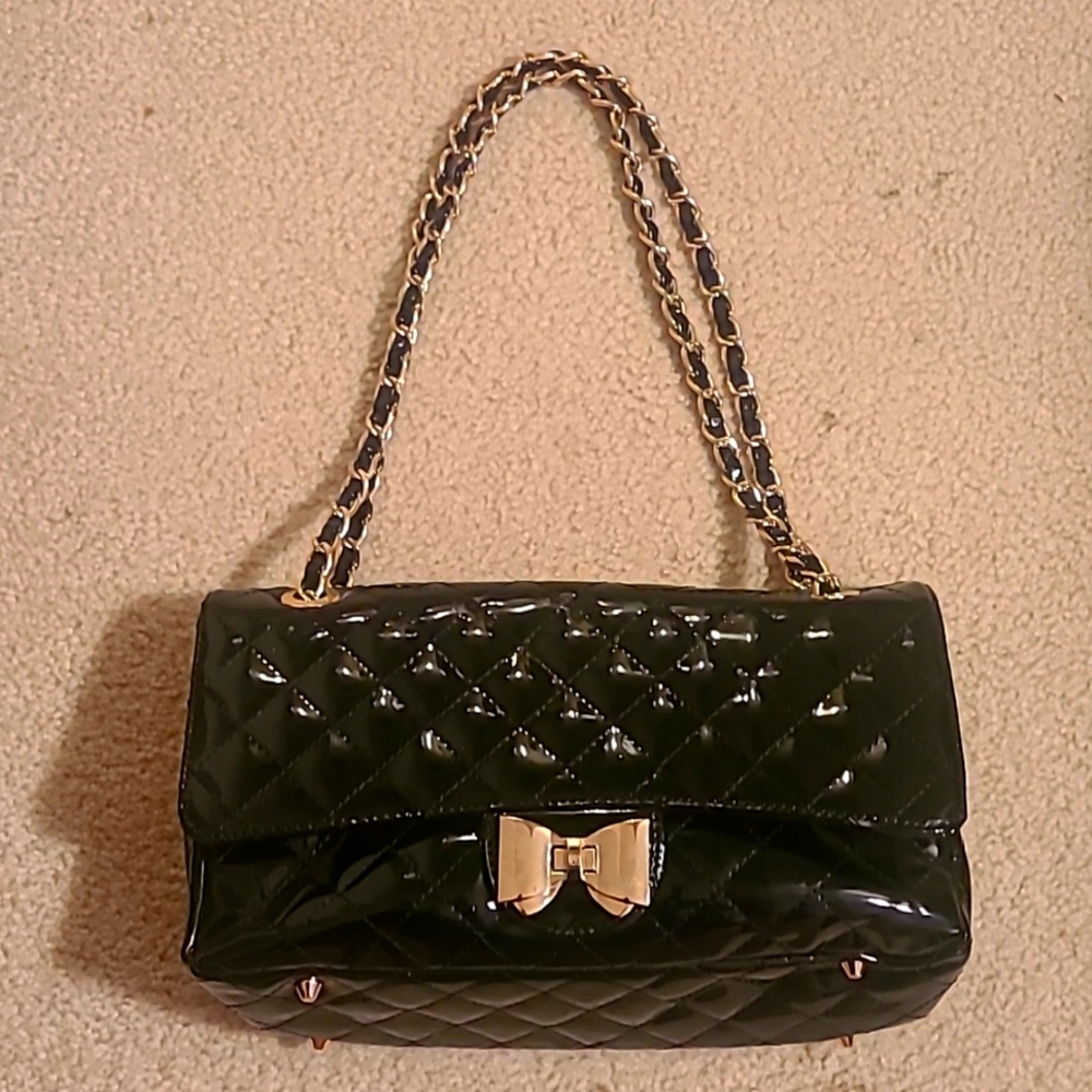Black Quilted Handbag with Gold Bow Details